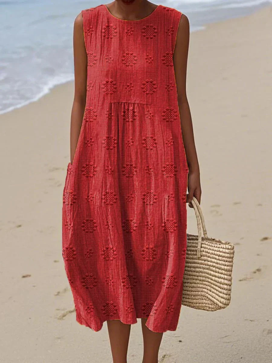 Stylisches ärmelloses Strandkleid Bella für Damen mit Taschen, perfekt für den Urlaub & entspannte Sommertage.