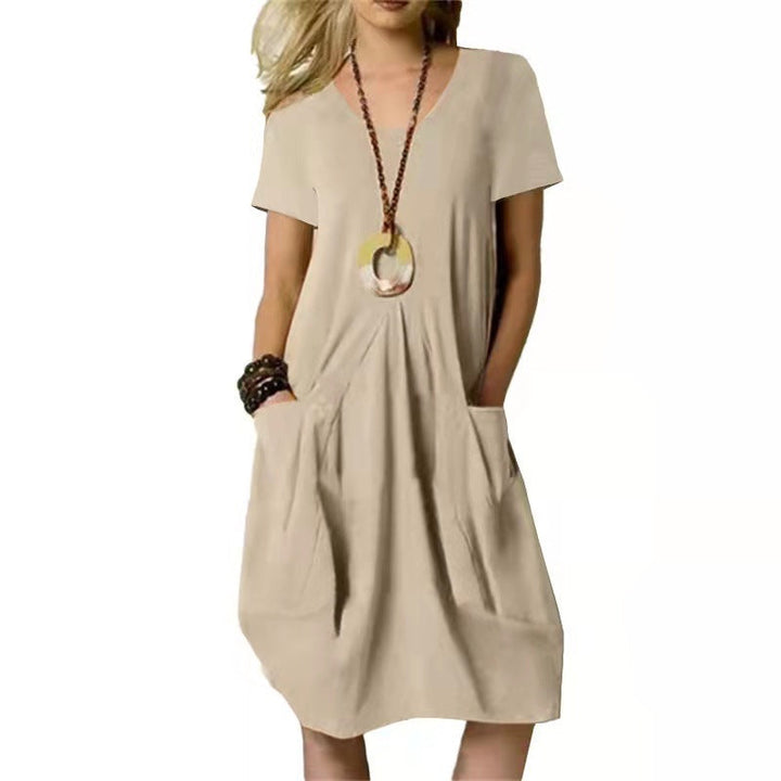 Locker geschnittenes Damen Sommerkleid, knielang. Ein bequemes Freizeitkleid, perfekt für entspannte Tage oder den Urlaub.