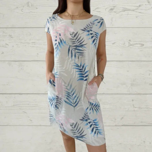 Das perfekte Damen Alltagskleid: bequemes Minikleid mit Kurzarm, Rundhals, Blumendruck und praktischen Taschen.