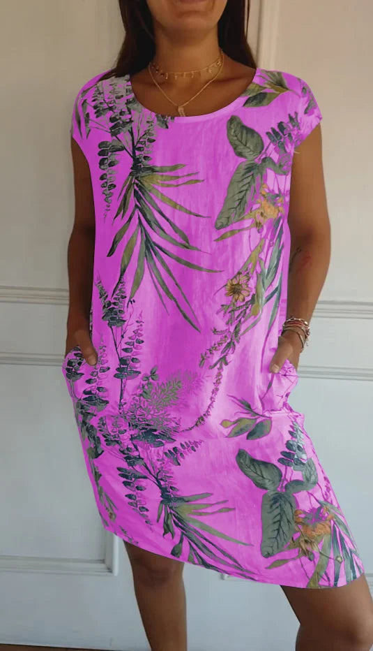 Trendiges Damen Freizeitkleid in Minilänge mit auffälligem Blumendruck und praktischen Eingrifftaschen.
