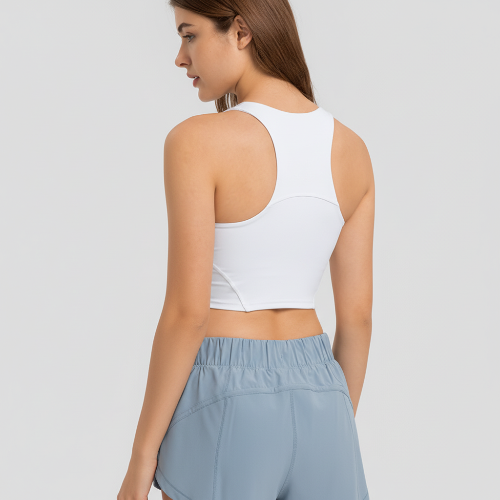 Damen Sporttop Shirley mit Racerback und Pads bietet Halt und Komfort bei jeder Sportart.
