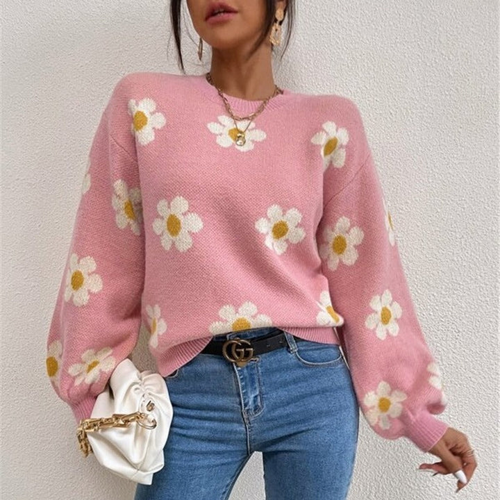 Damen Strickpullover mit Blumenmuster, eleganten Puffärmeln & Rundhals. Perfekt für Frühling & Herbst.