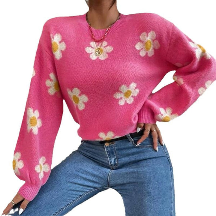 Moderner Damen Strickpullover mit zartem Blumenmuster, voluminösen Puffärmeln & weichem Material.