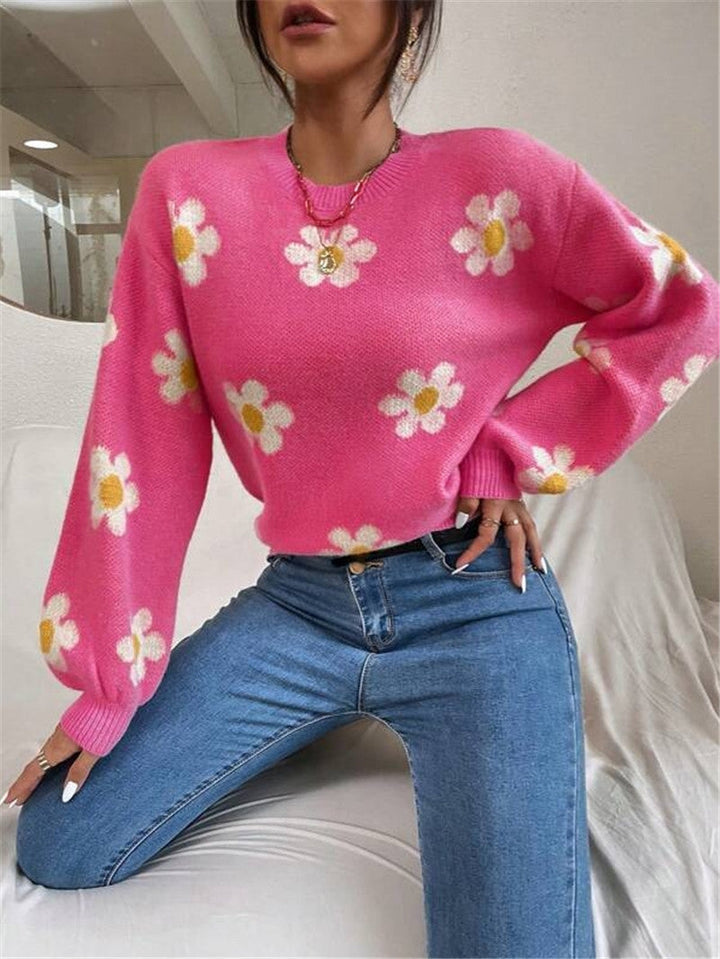 Femininer Damen Strickpullover mit stilvollem Blumenmuster, eleganten Puffärmeln & warmem Strick.