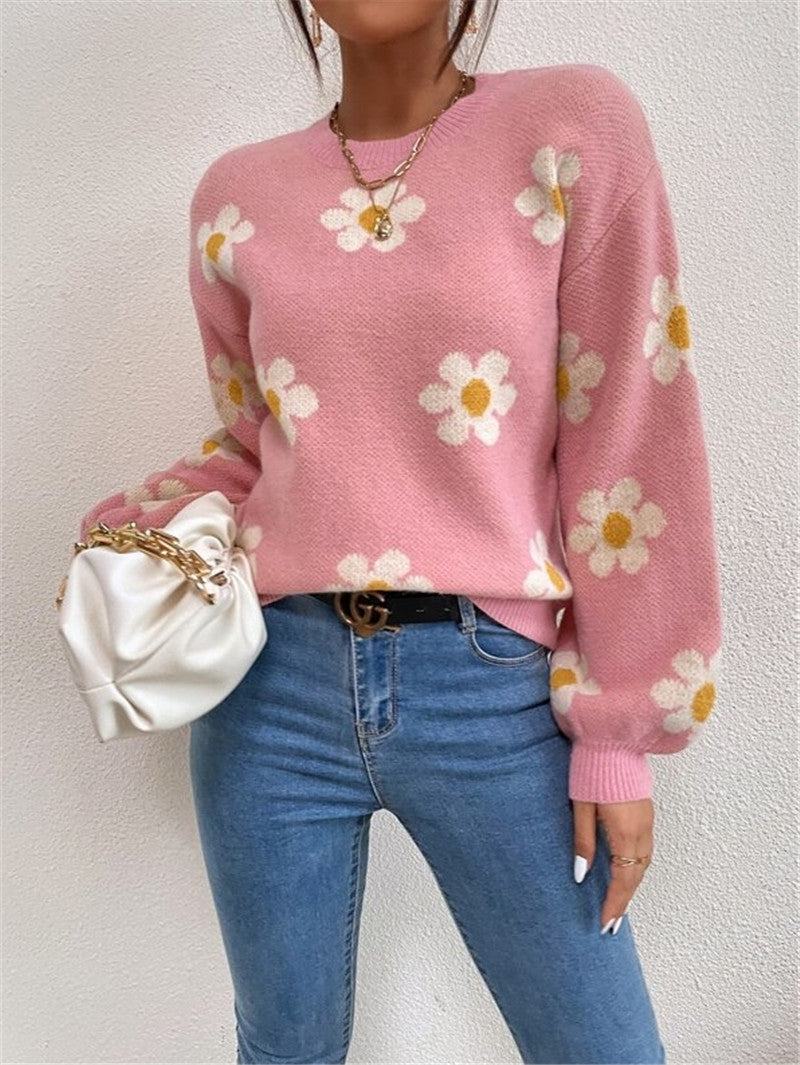 Beiger Damen Strickpullover mit lebhaftem Blumenmuster, eleganten Puffärmeln & hohem Tragekomfort.