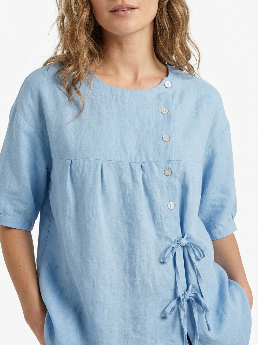 Blaue Damen Vintage-Langarmbluse Lily mit eleganter, lockerer Passform, vielseitig für Büro und Freizeit.