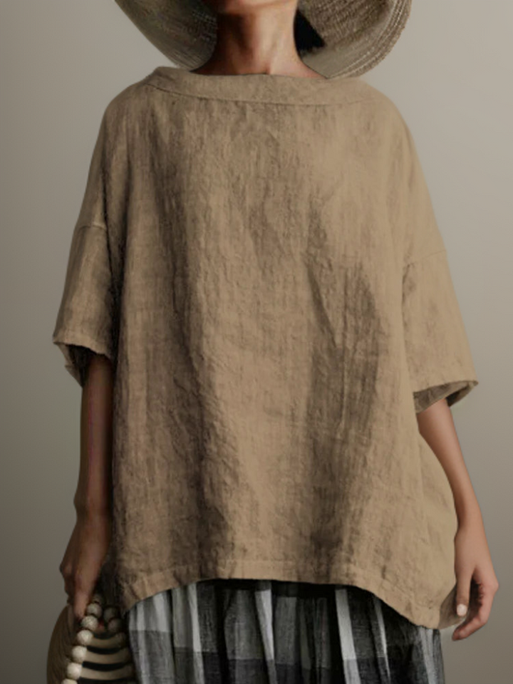 Damen Vintage Oversize Tunika mit bequemem Bootsausschnitt, schwarz-weißes Design, vielseitig kombinierbar.