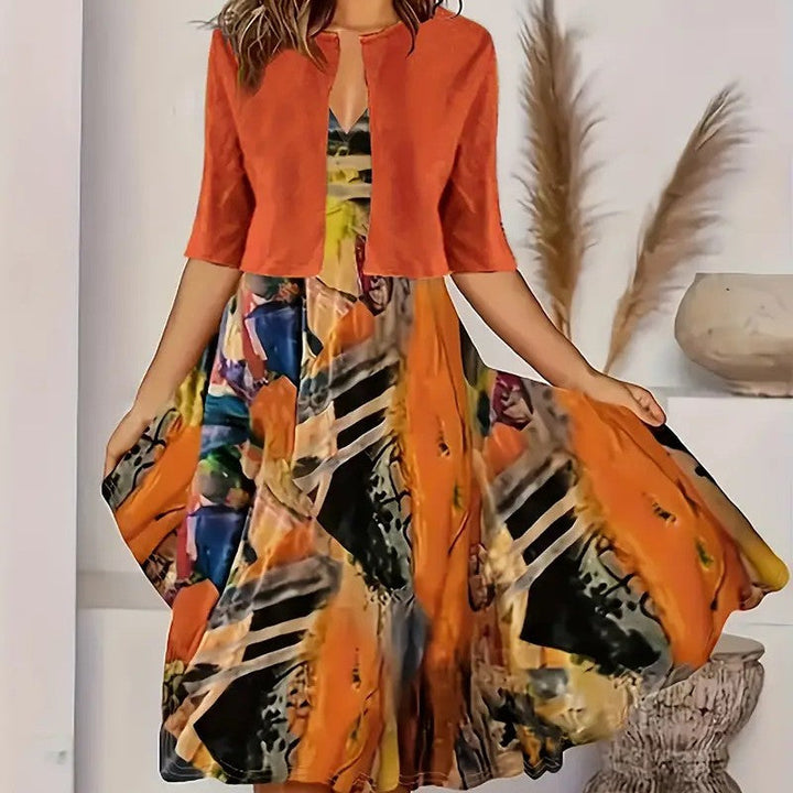 Stilvolles geschichtetes Damenkleid mit langer Strickjacke; modisches Freizeit-Ensemble.