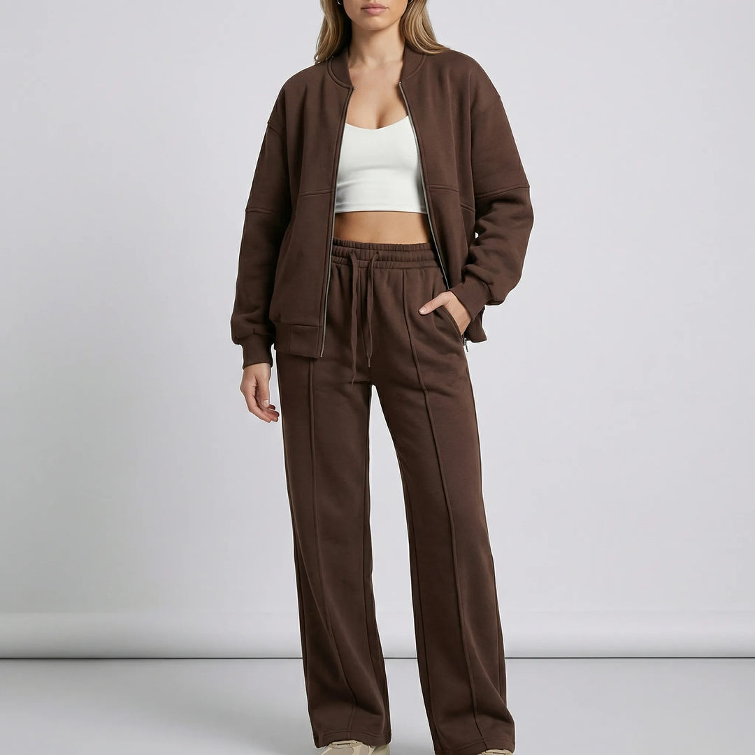 Komplettes Damen Zweiteiler Outfit mit Reißverschluss-Oberteil & eleganter Hose, für Büro oder Freizeit.