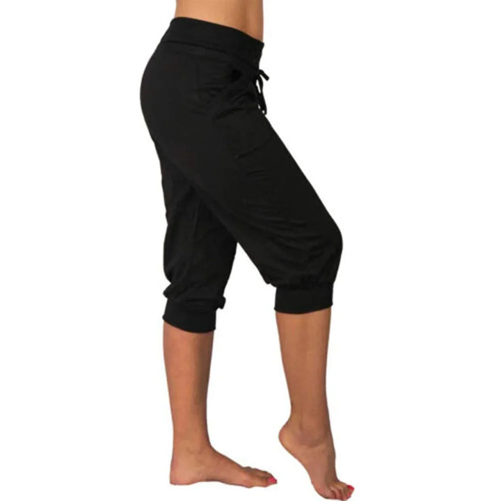 Moderne Damen Capri Jogger Hose, bequem & locker, mit Kordelzug und Taschen. Ideal für Freizeit & Alltag.