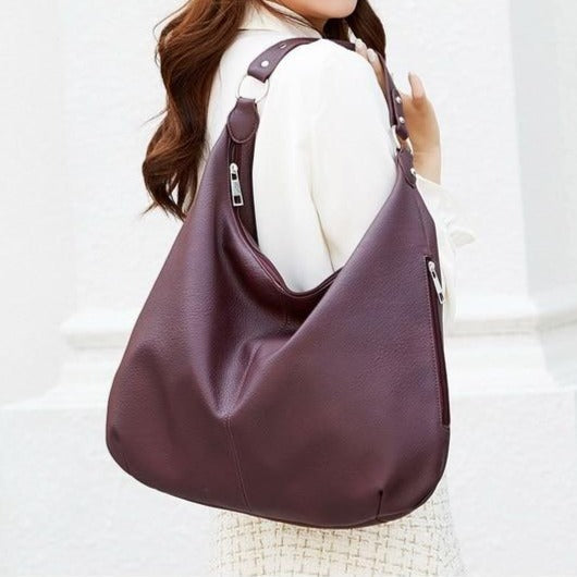Stilvolle Damen Schultertasche, perfekt kombinierbar mit jedem Outfit, ein Muss für jede Frau.