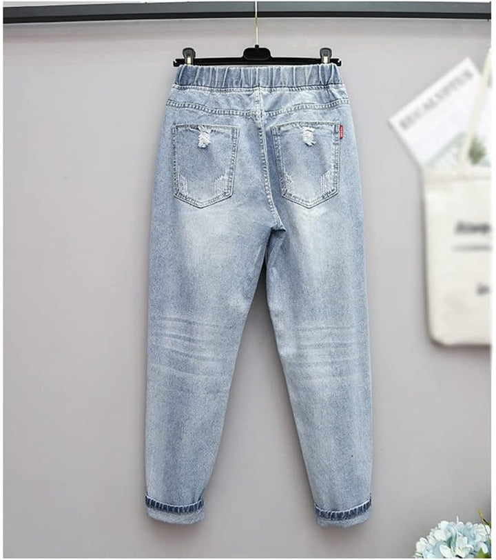 Bequeme Damen High-Waist Jeans in Übergröße mit Zerriss-Details. Ideale Plus-Size Hose für Curvy Herbst-Mode.