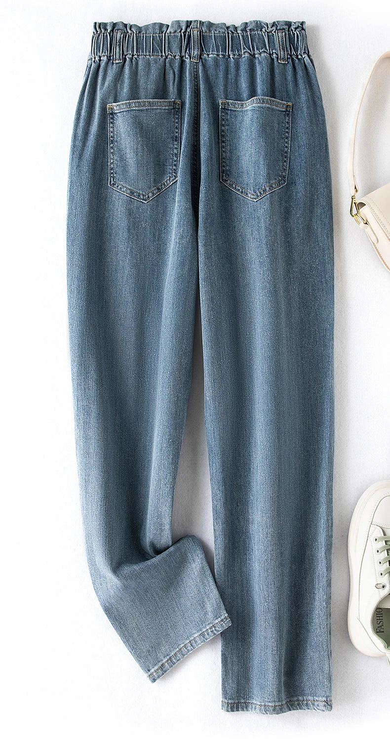 Damen High-Waist Stretch Jeans, Übergröße, mittelblau, vielseitig und bequem.
