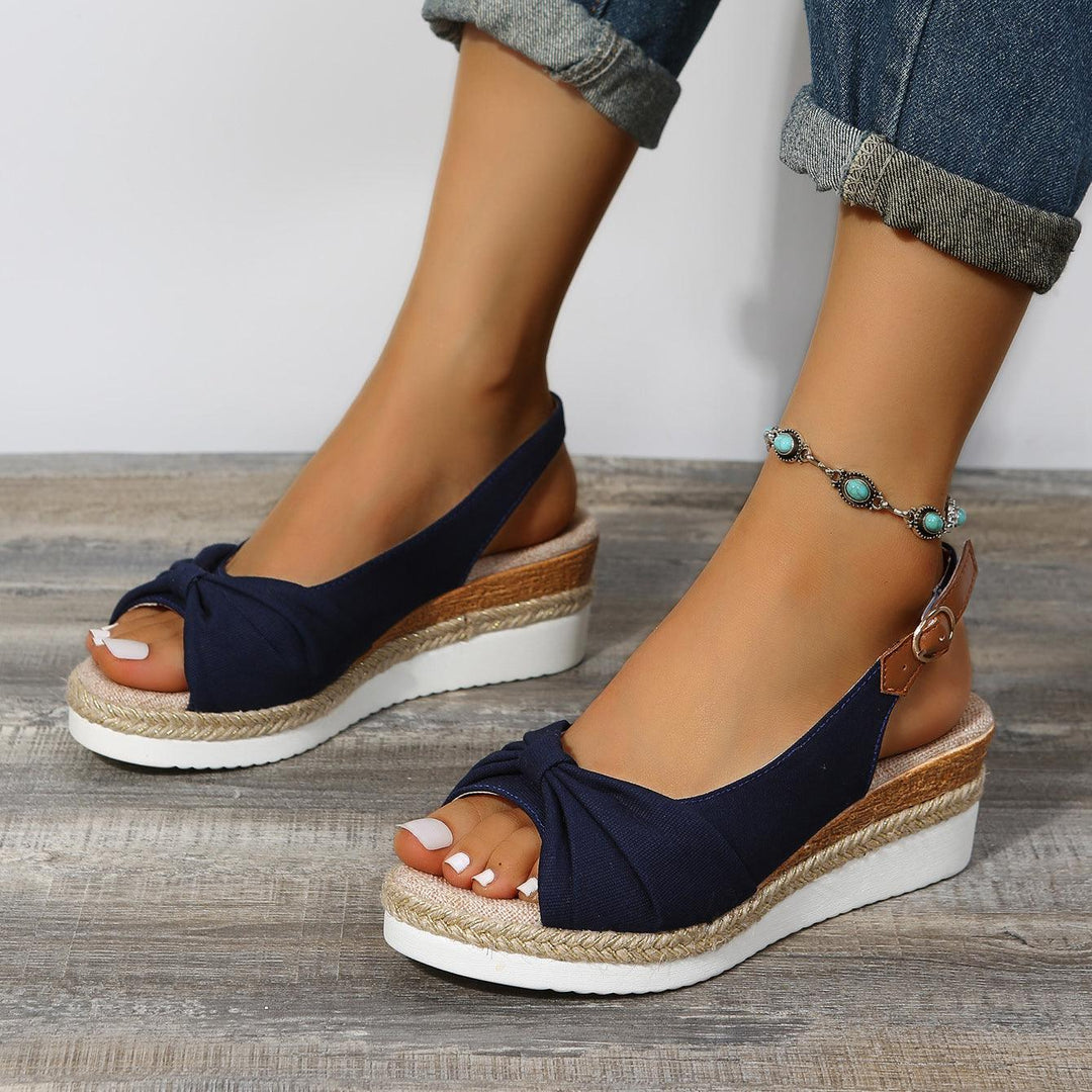 Sommerschuhe für Damen: Bequeme Keilsandalen mit modischem Absatz und guter Dämpfung.