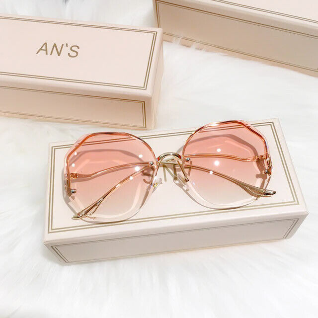 Hochwertige Luxus-Sonnenbrille, randlos mit Farbverlauf, optimaler UV-Schutz.