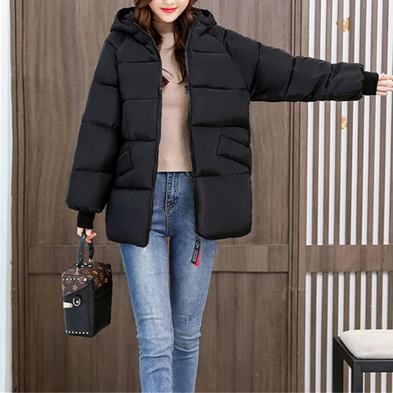 Damen Winter Pufferjacke, Übergroß mit Kapuze, perfekt für kalte Tage.