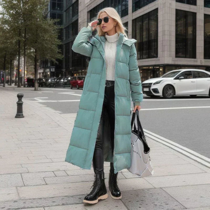 Warme Damen Pufferjacke, langer Schnitt, stilvolle Winterkleidung für den Alltag.