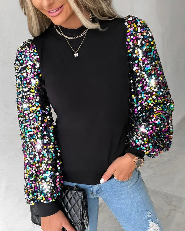 Damenbluse Lorena mit farbigen Ballonärmeln für einen trendigen Alltagslook.