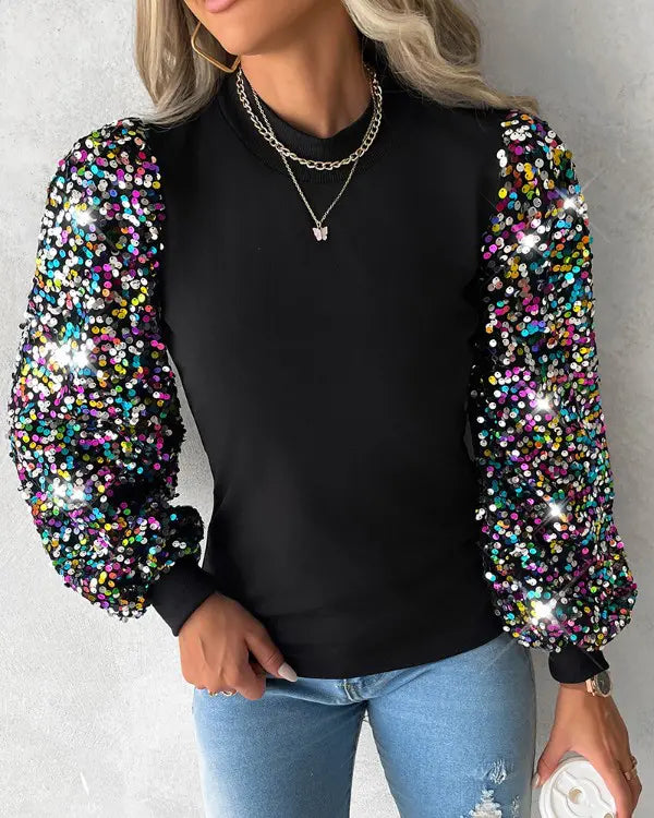 Modische Langarmbluse für Damen. Trendiges Oberteil mit farbigen Ballonärmeln für den schicken Freizeit-Look.