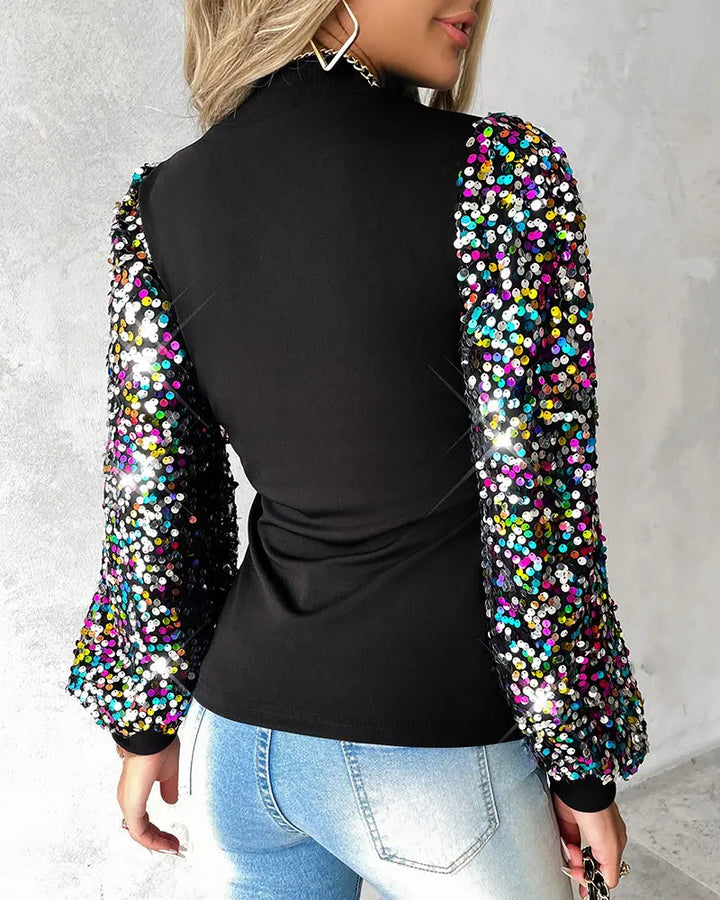 Schicke Damenbluse mit farbigen Ballonärmeln, perfekt als trendiges Oberteil für den eleganten Alltagslook.