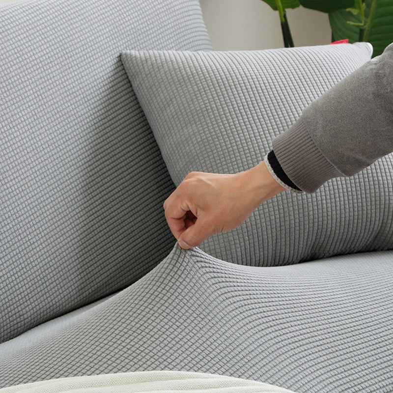 Beiger Sofabezug, dehnbare Qualität; tierfreundlicher Schutz und neuer Look für die Couch.