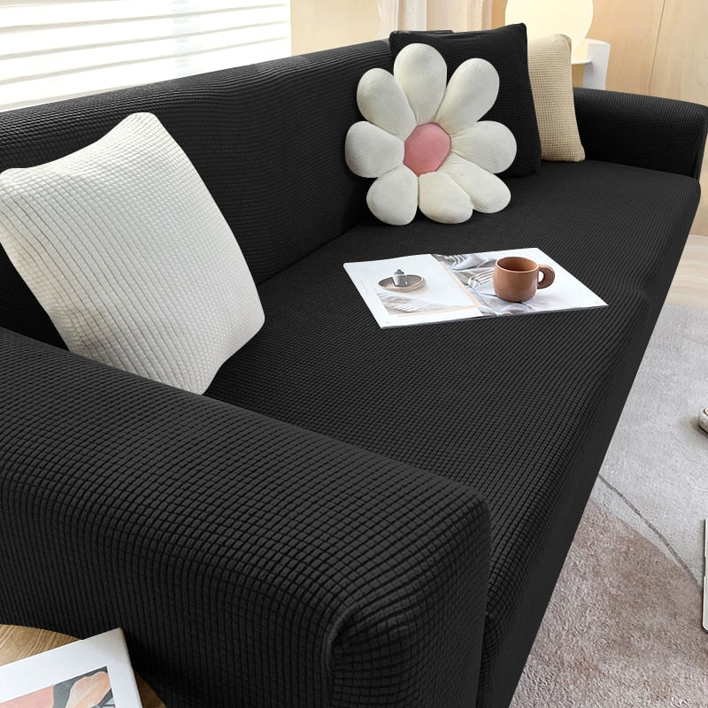 Farbenfrohe Dehnbare Sofahusse; Heimtextilien für stilvolle Wohnzimmer Dekoration.