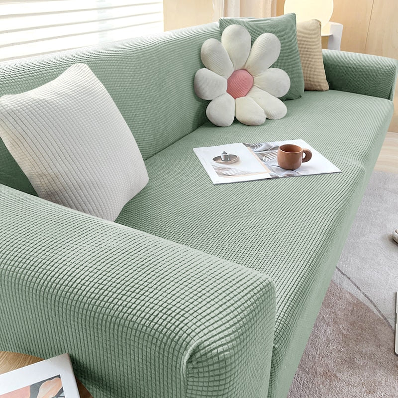 Schicke Sofahusse, farbenfroh; moderner Stretchbezug als Wohnzimmer Dekoration.