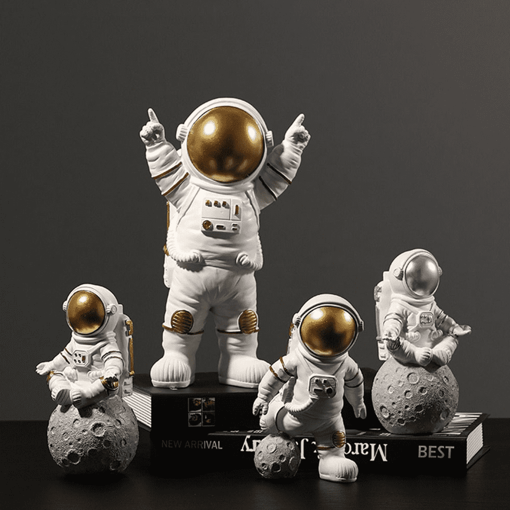 Inspirierende Astronauten-Deko aus Harz, gold-silber, ideal für Weltraum-Enthusiasten und Büros.