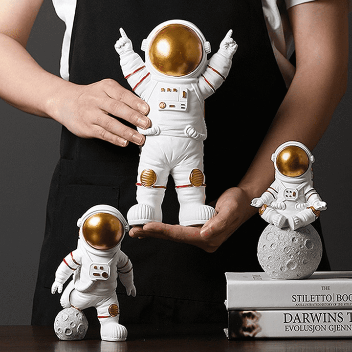Edle Astronauten-Figur aus Harz, hochglänzend, für zeitgenössische Wohnkultur und Motivation.