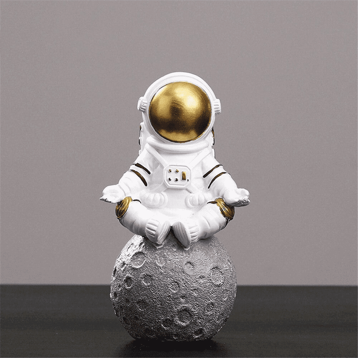 Kleine Astronauten-Skulptur aus Harz, Silber, perfekt für Regale, Tische oder als Weltraum-Geschenk.