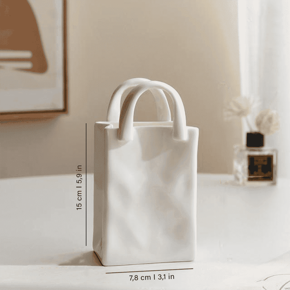 Anspruchsvolle Handtaschen Blumenvase aus Porzellan. Eleganter Akzent für jede moderne Wohndekoration.