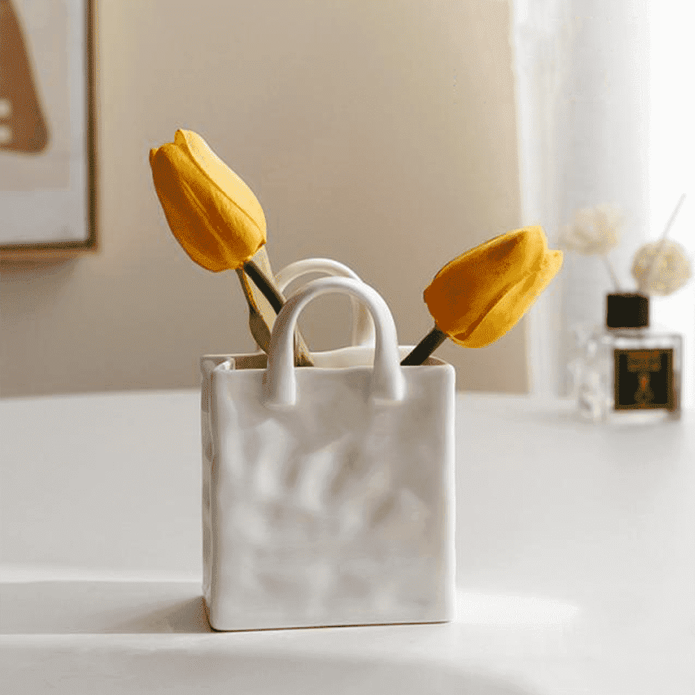Glänzende Porzellan Handtaschenvase, strapazierfähig & dekorativ. Perfekt für moderne Einrichtung & Blumen.