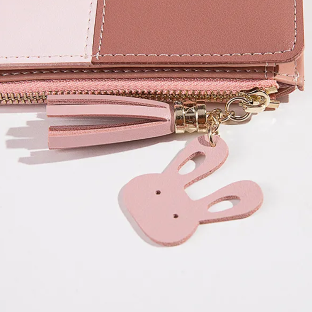 Alltagstaugliche Damen Geldbörse, minimalistisches Design mit Quasten-Reißverschluss, stilvoll und funktional.