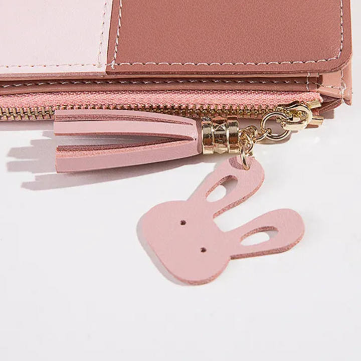 Alltagstaugliche Damen Geldbörse, minimalistisches Design mit Quasten-Reißverschluss, stilvoll und funktional.