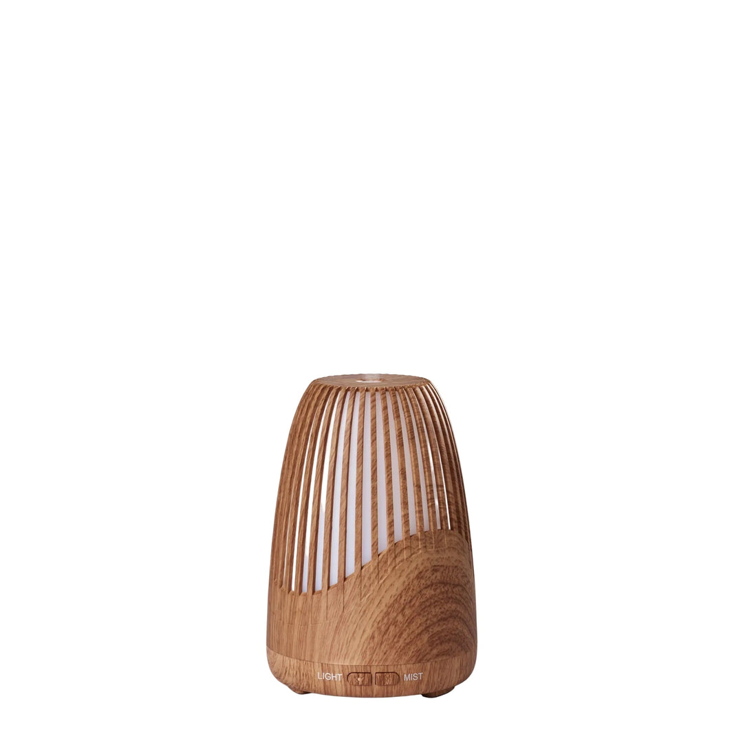 Eleganter Ultraschall Aroma Diffusor für ätherische Öle zur Entspannung und feinen Raumbeduftung in Schlafzimmer oder Büro.