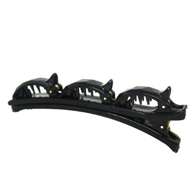 Hochwertiger Doppellagen Haarschmuck, schwarz, als praktischer Haarclip für trendige Frisuren.