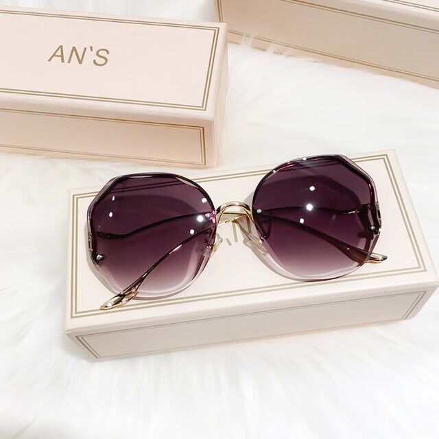 Stilvolle Farbverlauf-Sonnenbrille für Damen und Herren, ein elegantes Mode-Statement.
