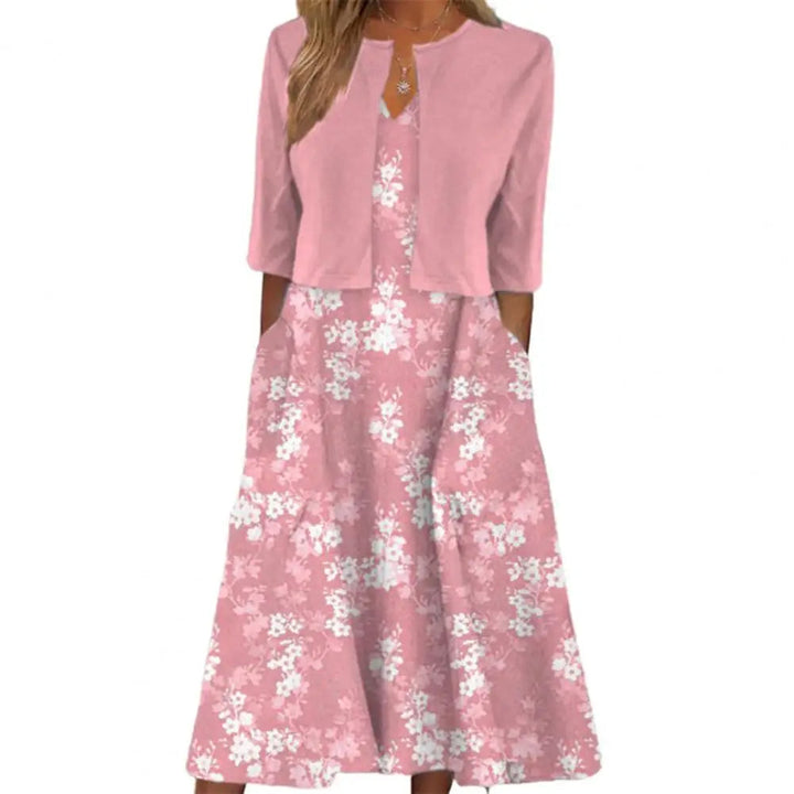 Vielseitiges Damen Midikleid mit Blumenmuster. Das A-Linien Sommerkleid mit Halbarm und Taschen ist ideal für Freizeit & Alltag.