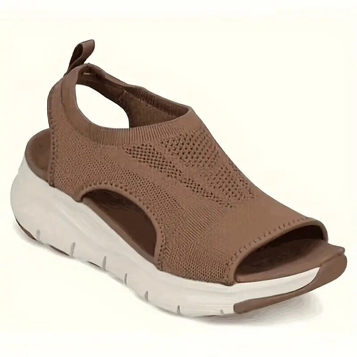 Ergonomische Damensandalen mit dämpfender Sohle und Fußgewölbestütze. Perfekt für lange Tage.
