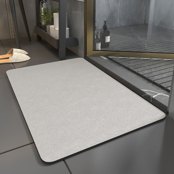 Premium DryStep Badematte für Ihr Badezimmer: extra saugfähig, schnelltrocknend und zuverlässig rutschfest.