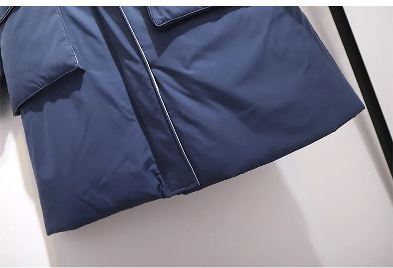 Warme Winterjacke für Damen in Übergröße, lang geschnitten & komfortabel.