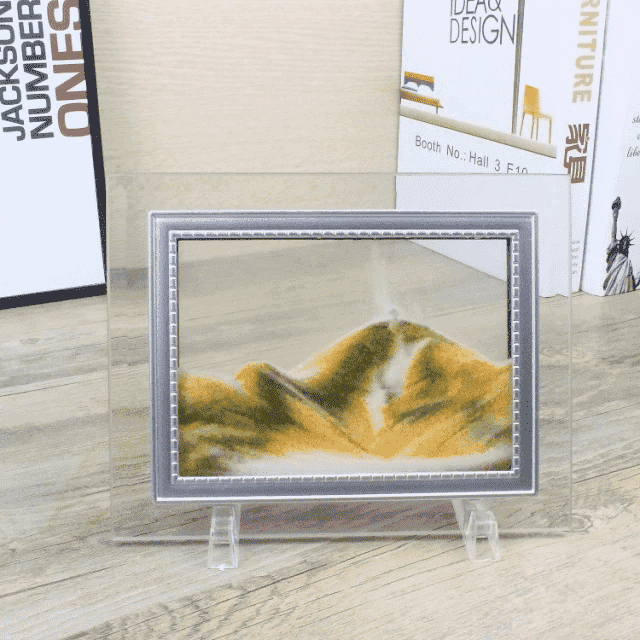 Beruhigendes dynamisches Sandbild aus Glas mit schwarzen und weißen Sandschichten. Ideal für Meditation & Konzentration.