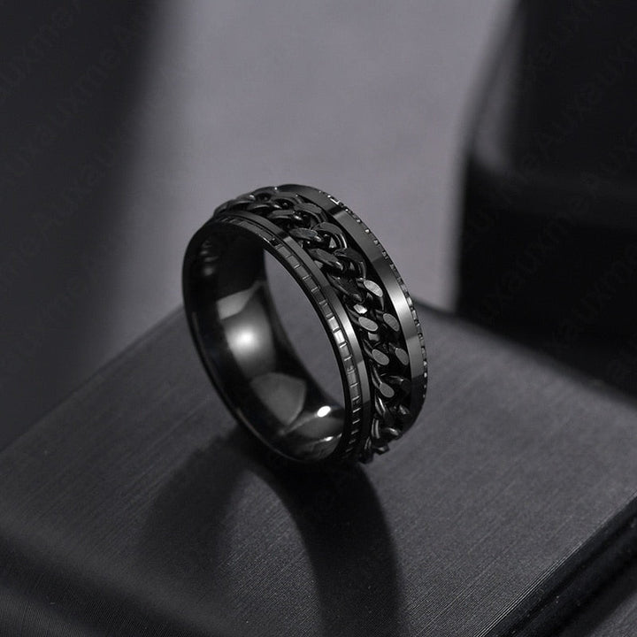Zwei Edelstahl-Angstringe nebeneinander, eleganter Spinnerring für Damen und Herren als Antistress-Schmuck.