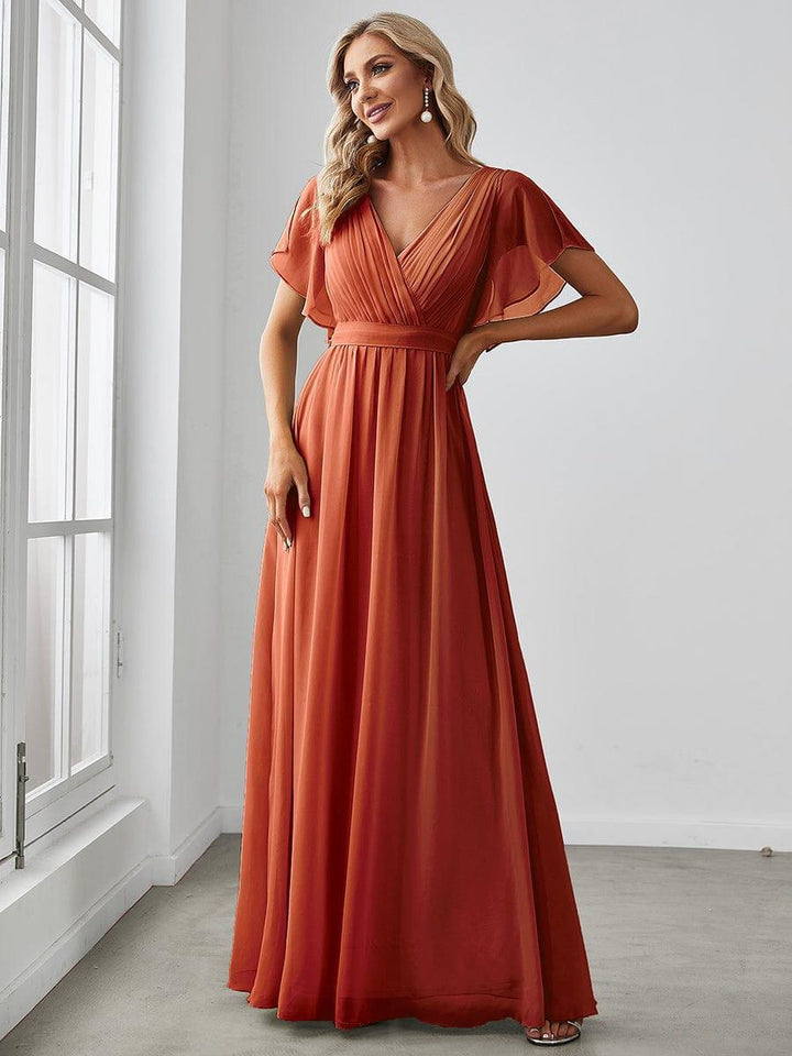 Elegantes mintgrünes Brautjungfernkleid, A-Linie, Flügelärmel, perfekt für Hochzeitsgäste.