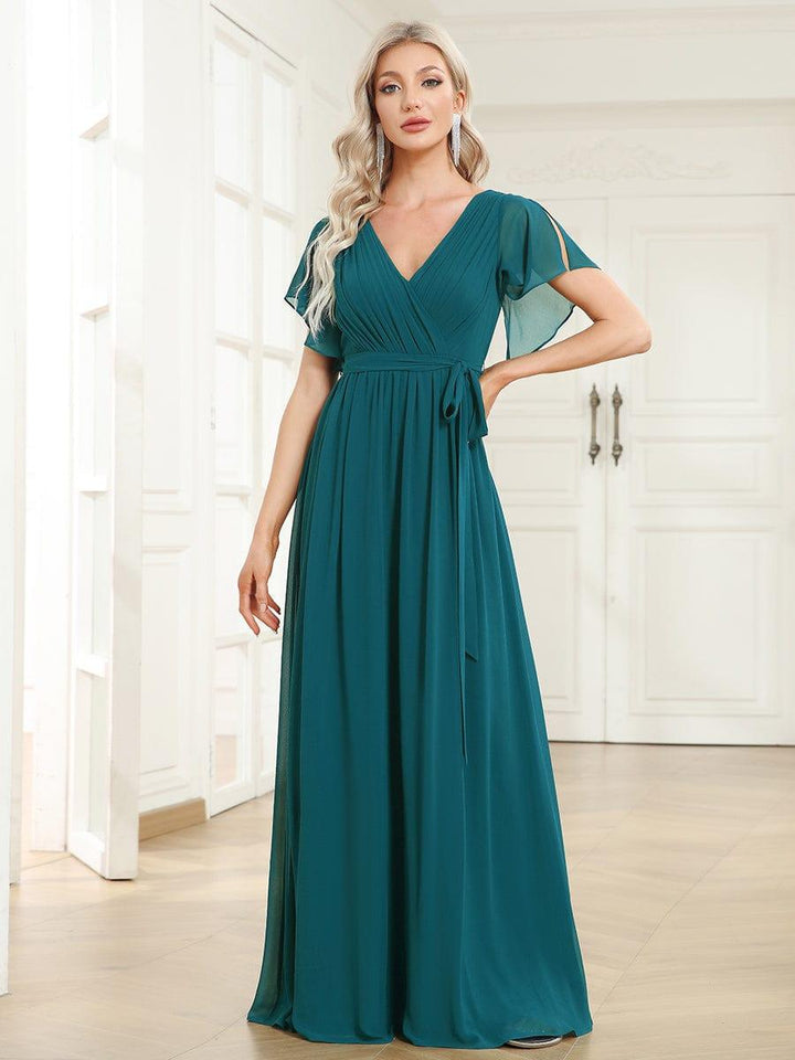 Elegantes mintgrünes A-Linie Abendkleid, Maxilänge, Flügelärmel, für festliche Anlässe.