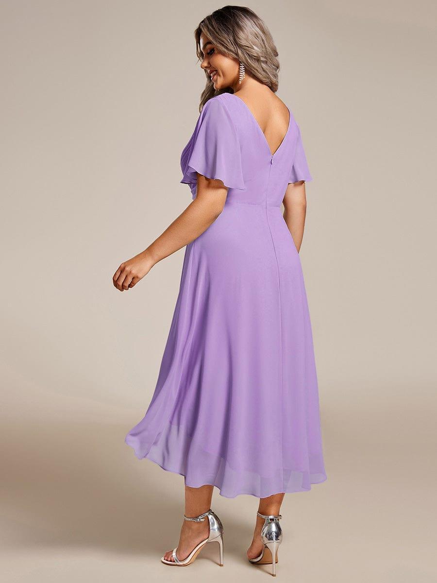 Stilvolles Puderrosa Damen Abendkleid, Vokuhila-Design, A-Linie, Midi-Länge; glamourös für Feste.