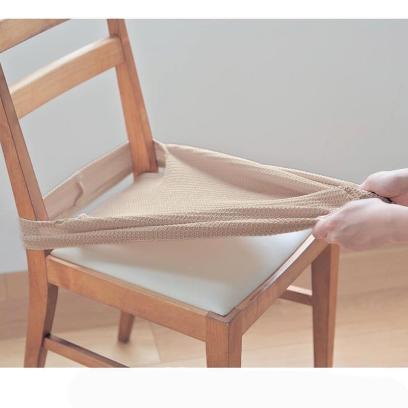 Grauer, elastischer Stuhlbezug aus Polyester-Spandex. Schützt Esszimmerstühle vor Flecken & Abnutzung.
