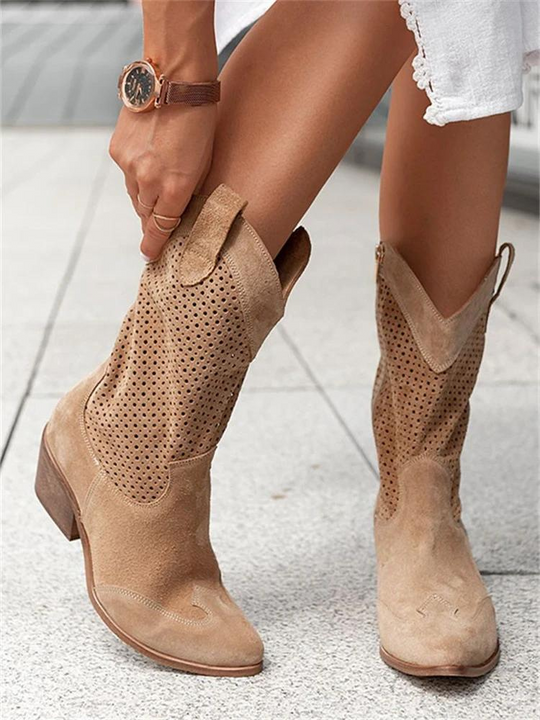 Trendige Damen Cowboystiefel in Weiß, aktuelle Schuhmode für Damen mit zeitlosem Design und Komfort.