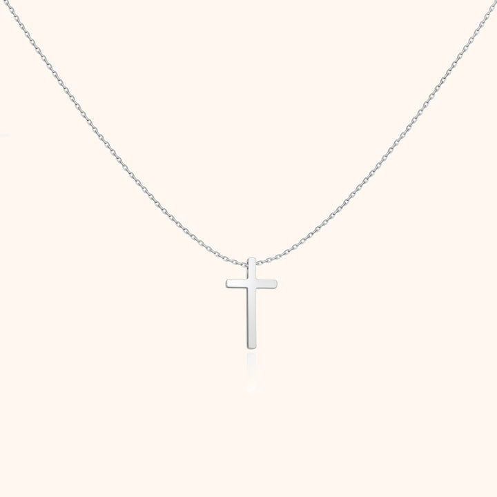 Hochwertiger vergoldeter Silberschmuck: Eleganter Kreuzanhänger an einer feinen Damenkette. Zeitloses Design.
