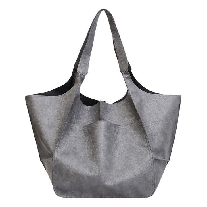 Damen Handtasche in edlem Schwarz aus weichem veganem Leder, elegant & vielseitig kombinierbar, leichtgewichtig.